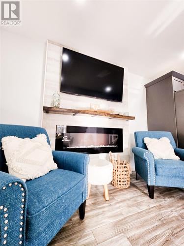 69 Wireless Road, Botwood, NL - Indoor Photo Showing Living Room With Fireplace