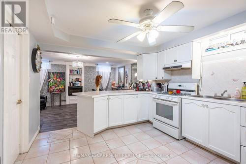 138 Beaverbrook Avenue, Hamilton, ON - Indoor Photo Showing Kitchen With Double Sink