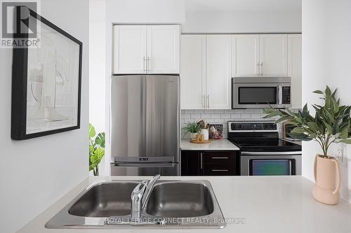 1119 - 61 Heintzman Street, Toronto, ON - Indoor Photo Showing Kitchen With Double Sink