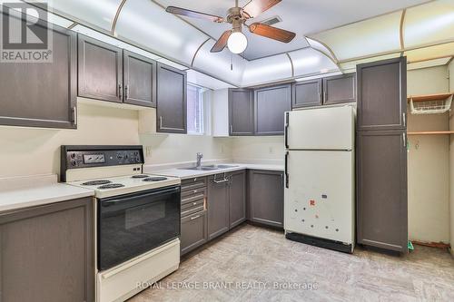 128 Aspen Street, Brant, ON - Indoor Photo Showing Kitchen With Double Sink