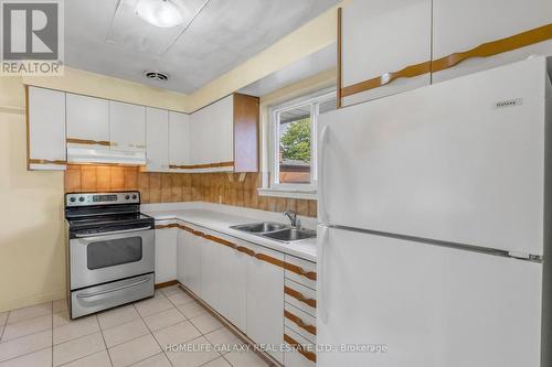 22 Denver Place, Toronto, ON - Indoor Photo Showing Kitchen With Double Sink