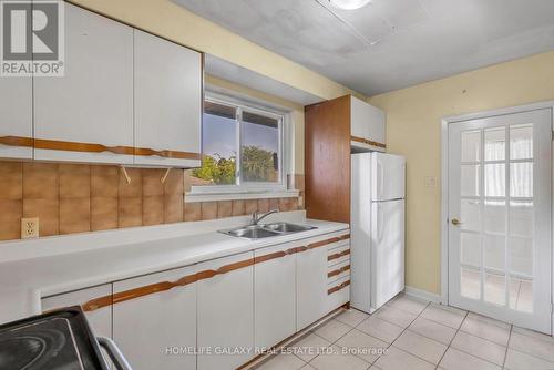 22 Denver Place, Toronto, ON - Indoor Photo Showing Kitchen With Double Sink