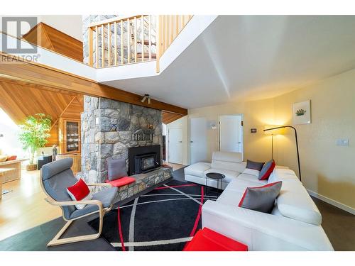 16709 Maki Road, Lake Country, BC - Indoor Photo Showing Living Room With Fireplace