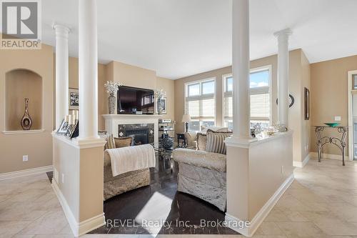 6931 Courtney Crescent, Niagara Falls (219 - Forestview), ON - Indoor Photo Showing Living Room With Fireplace