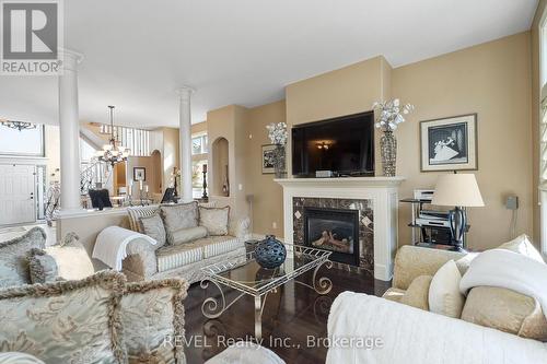 6931 Courtney Crescent, Niagara Falls (219 - Forestview), ON - Indoor Photo Showing Living Room With Fireplace