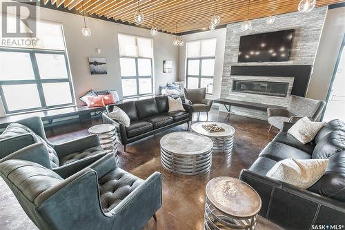 508A 3359 Green Poppy Street, Regina, SK - Indoor Photo Showing Living Room With Fireplace