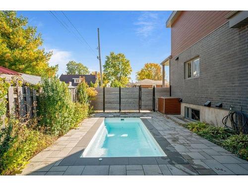 Backyard - 31 Av. Verdi, Laval (Laval-Des-Rapides), QC - Outdoor With In Ground Pool