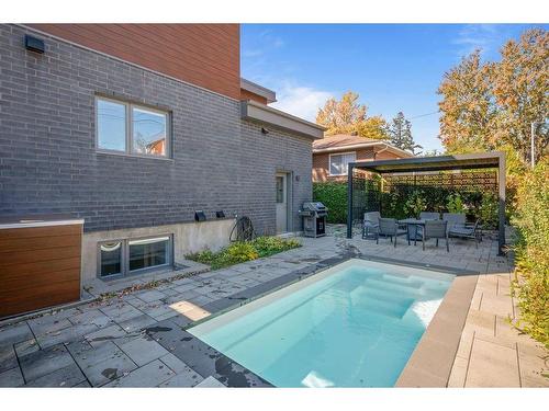 Backyard - 31 Av. Verdi, Laval (Laval-Des-Rapides), QC - Outdoor With In Ground Pool