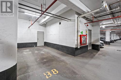 204 - 233 Carlaw Avenue, Toronto, ON - Indoor Photo Showing Garage