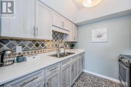 107 - 107 Bagot Street, Guelph (Onward Willow), ON - Indoor Photo Showing Kitchen With Double Sink