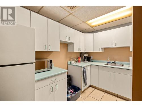 Kitchenette in theatre room - 761 Siwash Court, Kelowna, BC - Indoor