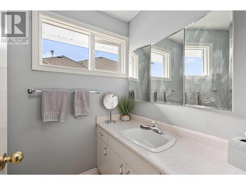 Bathroom by laundry and garage - 761 Siwash Court, Kelowna, BC - Indoor Photo Showing Bathroom