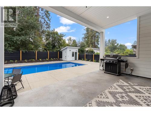 689 Balsam Road, Kelowna, BC - Outdoor With In Ground Pool With Deck Patio Veranda With Exterior