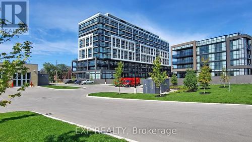 715 - 50 George Butchart Drive E, Toronto, ON - Outdoor With Facade