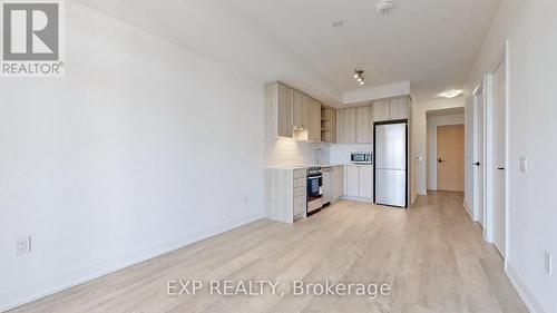 715 - 50 George Butchart Drive E, Toronto, ON - Indoor Photo Showing Kitchen