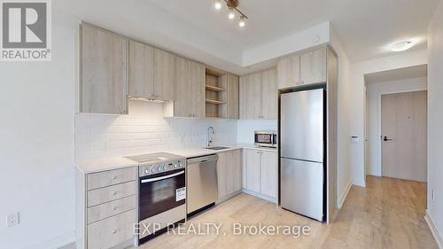 715 - 50 George Butchart Drive E, Toronto, ON - Indoor Photo Showing Kitchen