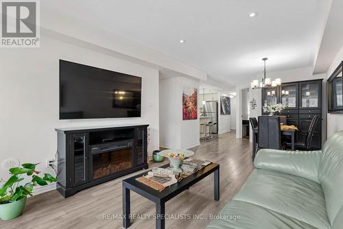 5-01 - 2420 Baronwood Drive, Oakville, ON - Indoor Photo Showing Living Room With Fireplace