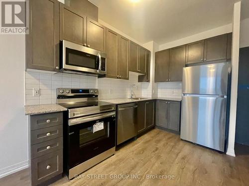 309 - 3265 Carding Mill Trail, Oakville, ON - Indoor Photo Showing Kitchen