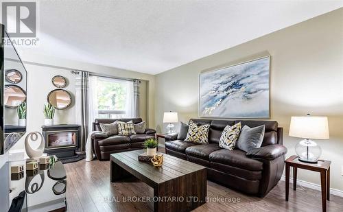 20 Elderridge Court, Hamilton, ON - Indoor Photo Showing Living Room With Fireplace