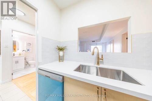 319 - 2351 Kennedy Road, Toronto, ON - Indoor Photo Showing Kitchen With Double Sink