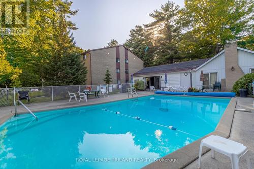 202 - 10 Lake Road, Lambton Shores (Grand Bend), ON - Outdoor With In Ground Pool With Backyard