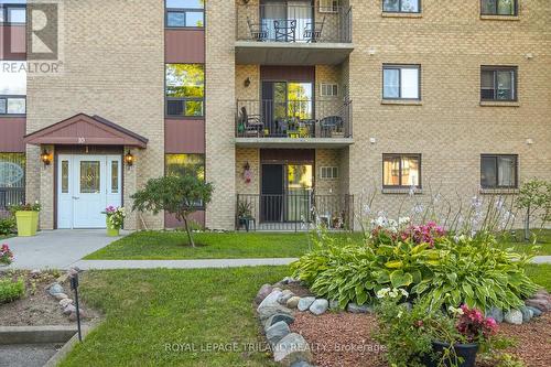 202 - 10 Lake Road, Lambton Shores (Grand Bend), ON - Outdoor With Balcony With Facade