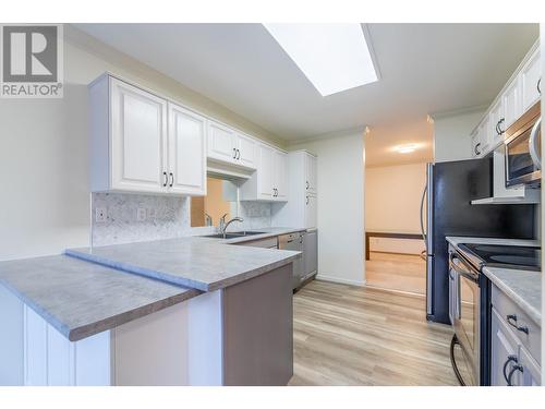 8907 Pineo Court Unit# 70, Summerland, BC - Indoor Photo Showing Kitchen With Double Sink