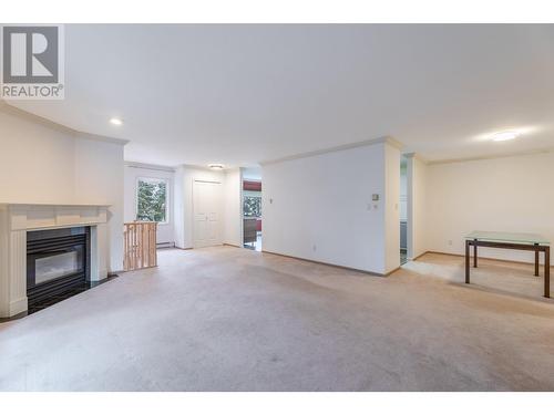 8907 Pineo Court Unit# 70, Summerland, BC - Indoor Photo Showing Other Room With Fireplace