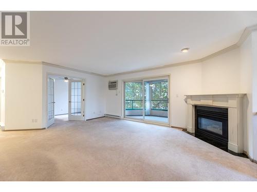 8907 Pineo Court Unit# 70, Summerland, BC - Indoor Photo Showing Living Room With Fireplace