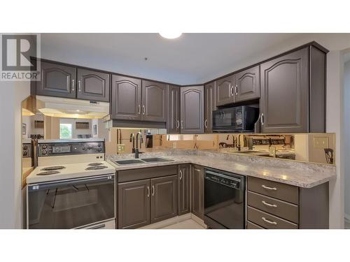 920 Argyle Street Unit# 203, Penticton, BC - Indoor Photo Showing Kitchen With Double Sink