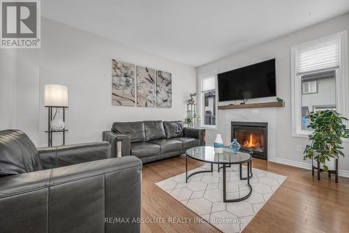 730 Perseus Avenue, Ottawa, ON - Indoor Photo Showing Living Room With Fireplace