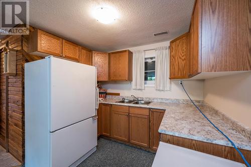 7713 Thompson Drive, Prince George, BC - Indoor Photo Showing Kitchen With Double Sink