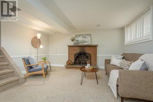 7984 Michael Street, Niagara Falls, ON - Indoor Photo Showing Living Room With Fireplace