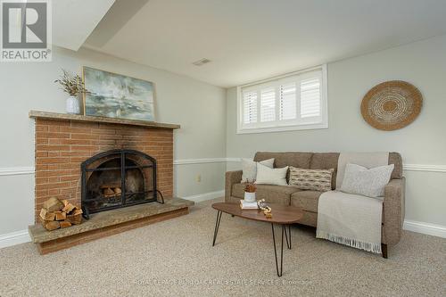 7984 Michael Street, Niagara Falls, ON - Indoor Photo Showing Living Room With Fireplace