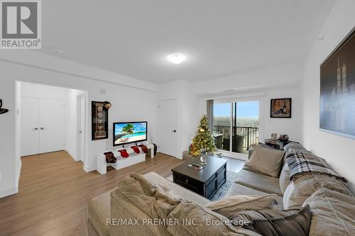 404 - 4 Spice Way, Barrie, ON - Indoor Photo Showing Living Room