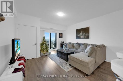 404 - 4 Spice Way, Barrie, ON - Indoor Photo Showing Living Room