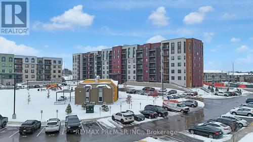 404 - 4 Spice Way, Barrie, ON - Outdoor With Facade