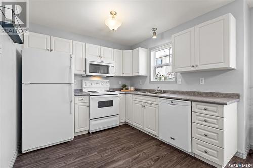 100 203 Herold Terrace, Saskatoon, SK - Indoor Photo Showing Kitchen With Double Sink