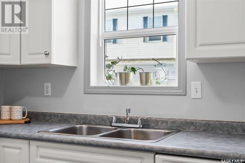 100 203 Herold Terrace, Saskatoon, SK - Indoor Photo Showing Kitchen With Double Sink