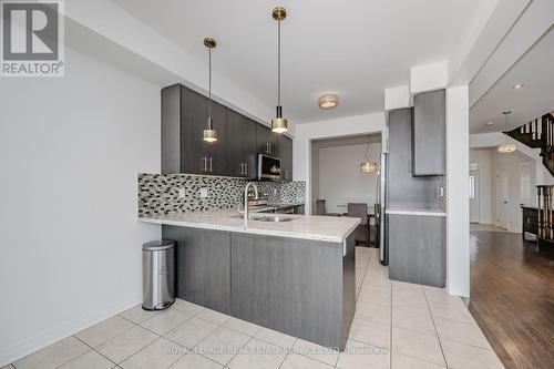 8 - 2019 Trawden Way, Oakville, ON - Indoor Photo Showing Kitchen With Upgraded Kitchen