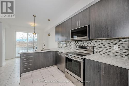 8 - 2019 Trawden Way, Oakville, ON - Indoor Photo Showing Kitchen With Double Sink With Upgraded Kitchen