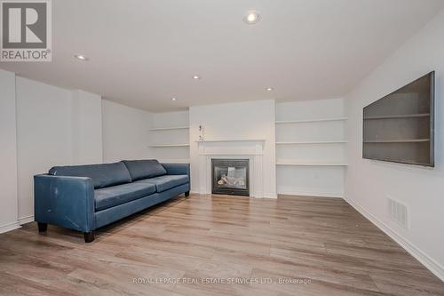 8 - 2019 Trawden Way, Oakville, ON - Indoor Photo Showing Other Room With Fireplace