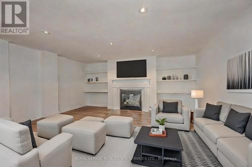 8 - 2019 Trawden Way, Oakville, ON - Indoor Photo Showing Living Room With Fireplace