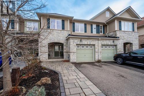 8 - 2019 Trawden Way, Oakville, ON - Outdoor With Facade