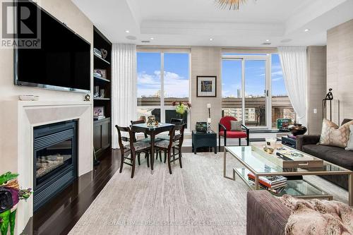 1701 - 155 St Clair Avenue W, Toronto, ON - Indoor Photo Showing Living Room With Fireplace