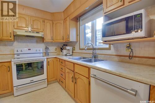 202 3130 Louise Street, Saskatoon, SK - Indoor Photo Showing Kitchen With Double Sink