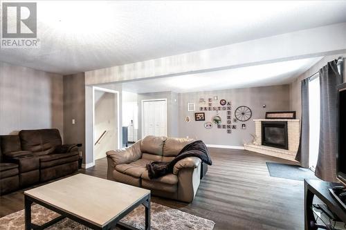 3861 Macmillan Drive, Val Caron, ON - Indoor Photo Showing Living Room With Fireplace