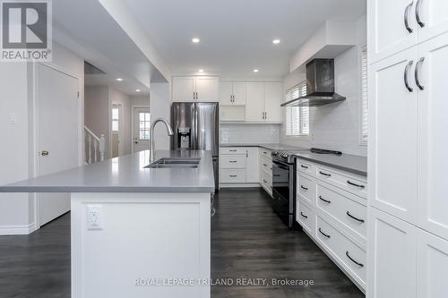 944 Thistledown Way, London, ON - Indoor Photo Showing Kitchen With Double Sink With Upgraded Kitchen