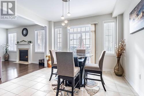 28 Speedwell Street, Brampton, ON - Indoor Photo Showing Dining Room With Fireplace