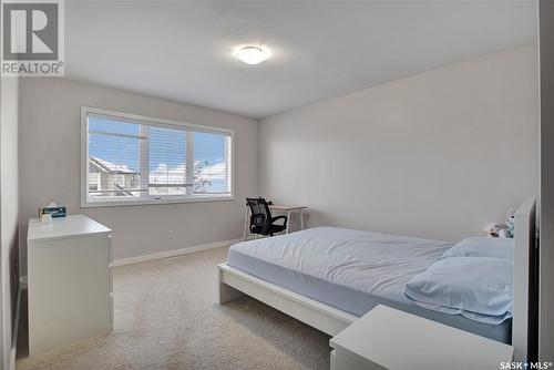 202 410 Hunter Road, Saskatoon, SK - Indoor Photo Showing Bedroom